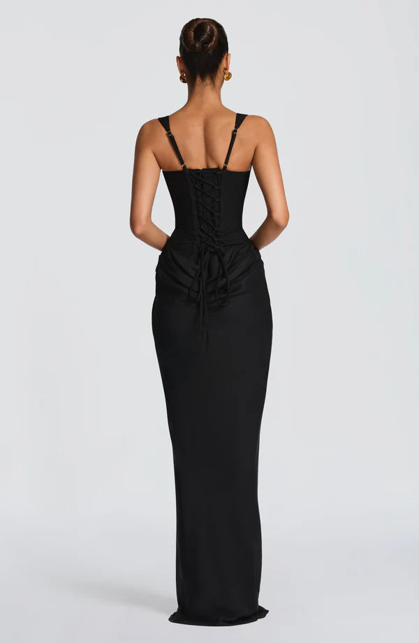Black halter bodycon maxi dress by LORVENES featuring a fitted silhouette and elegant design, perfect for stylish occasions.