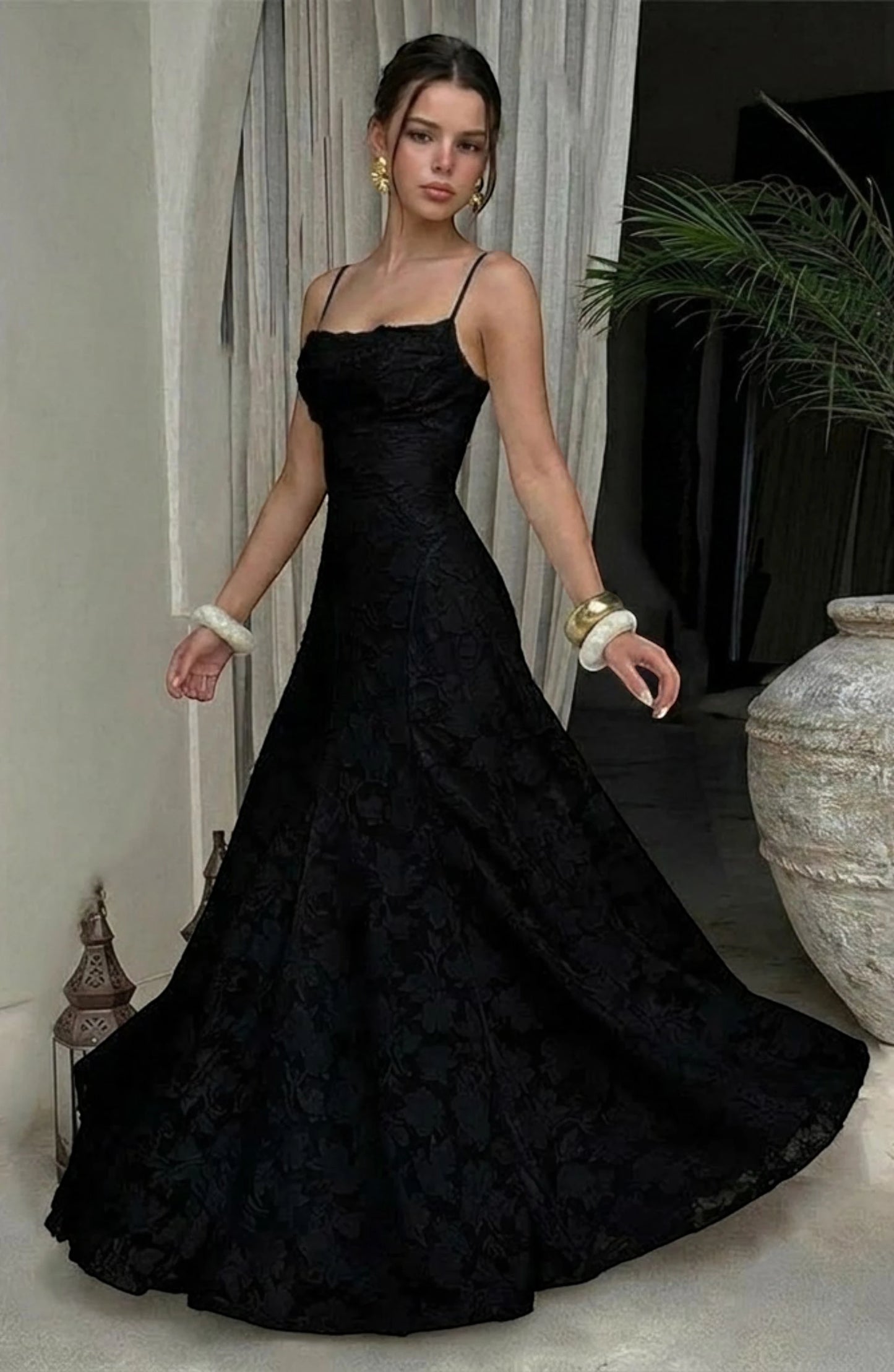 LORVENES sexy flowy bridal dress with delicate fabric and elegant design, perfect for a romantic wedding celebration.