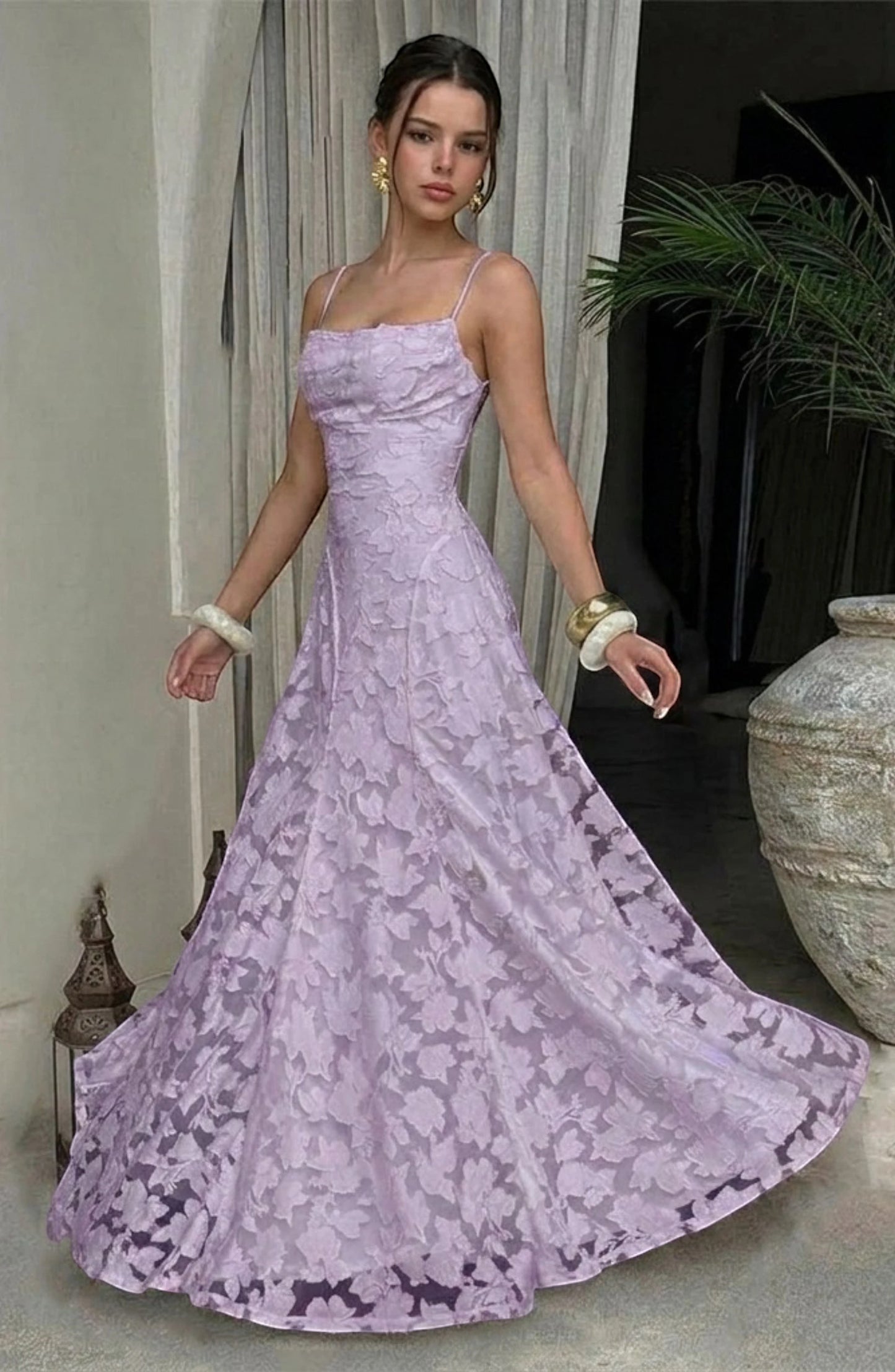 Flowy white bridal dress by LORVENES featuring elegant, lightweight fabric and a romantic, flowing silhouette for wedding occasions.