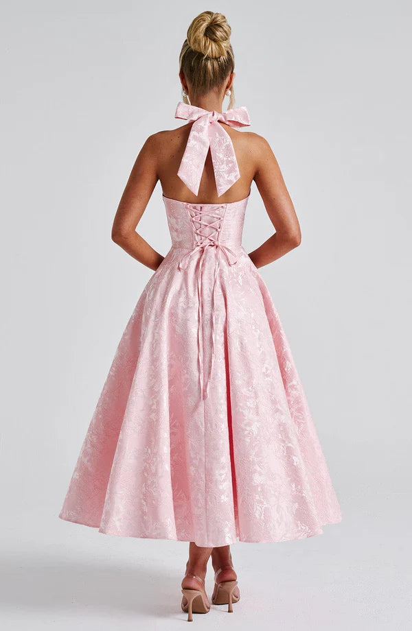 Blush Modern Flow Maxi dress by LORVENE featuring a flowing silhouette and elegant design, displayed on a mannequin.