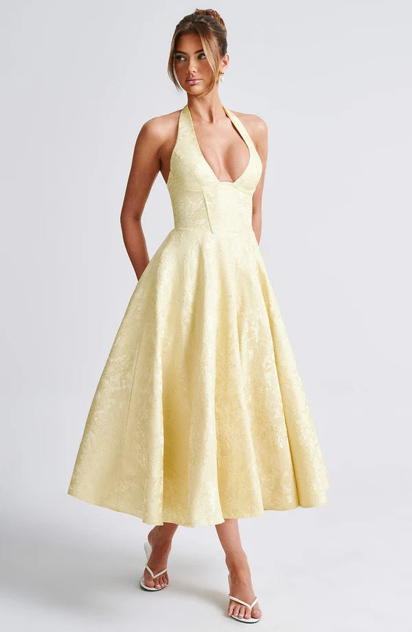 LORVENE Modern Flow Maxi dress in lemon color, featuring a flowing midi design with a fitted bodice and sleeveless style.