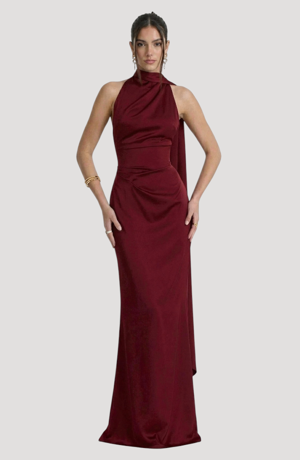 LORVENES claret satin halter evening dress displayed on a mannequin, showcasing its elegant halter neckline and flowing satin fabric.
