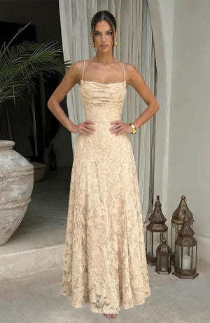 Elegant flowy evening dress by LORVENES featuring a flattering silhouette and soft fabric, perfect for formal events.