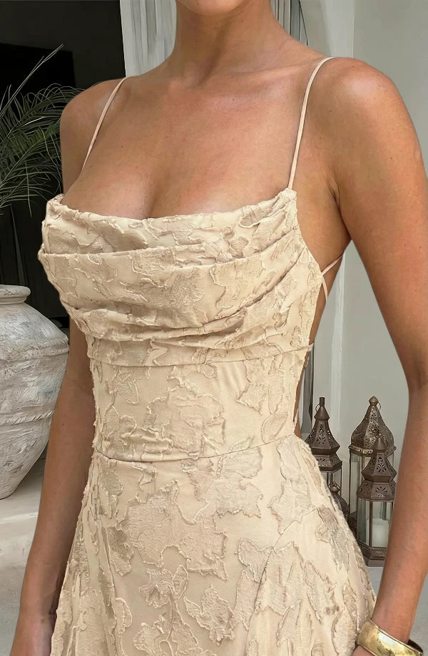 Elegant flowy evening dress by LORVENES featuring a flattering silhouette and soft fabric, suitable for formal events.