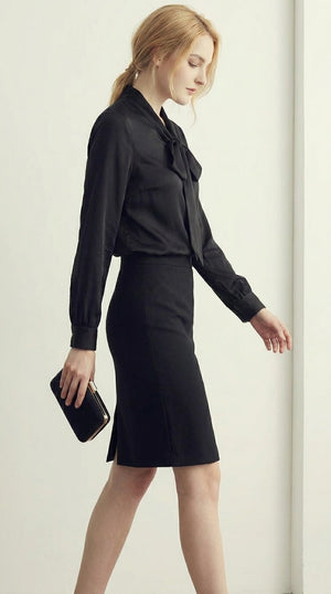 LORVENE Double Pocket Shirt with two front chest pockets, lightweight fabric, and button-down design, shown from bottom left angle.