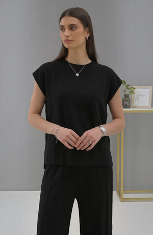 Koreanischer schicker Temperament-Pullover mit Rundhalsausschnitt und weiten Fledermausärmeln + Freizeithose mit hoher Taille und weitem Bein im Anzug