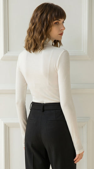 LORVENE Signature Soft Blouse Shirt in a light, flowy fabric with a classic collar and long sleeves, hanging on a hanger.