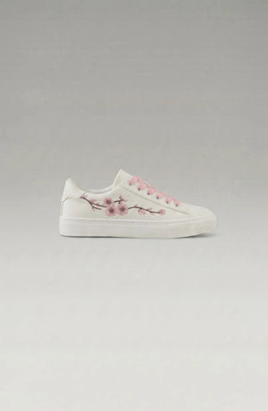 LORVENE Crystal Tone sneakers with clear crystal accents and white rubber soles, stylish casual footwear for everyday wear.