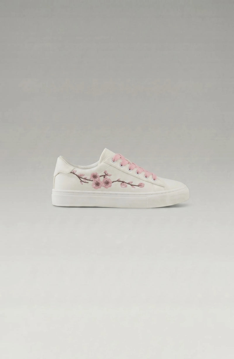 LORVENE Crystal Tone sneakers with clear crystal accents and white rubber soles, stylish casual footwear for everyday wear.