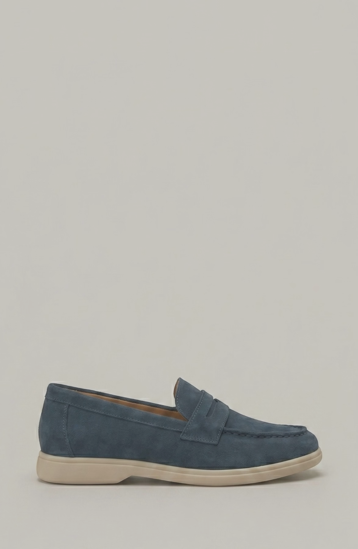LORVENE Parisian Luxe loafers in classic brown leather with elegant stitching and a sleek slip-on design.