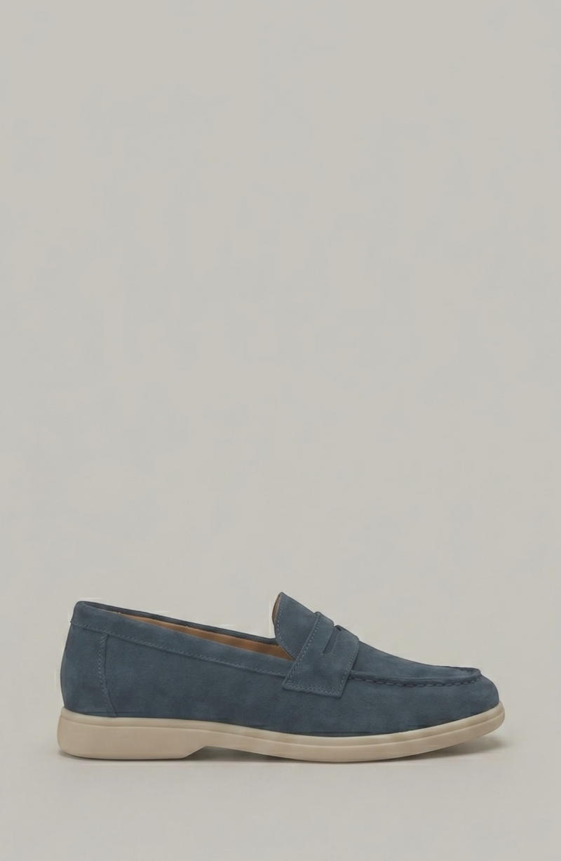 LORVENE Parisian Luxe loafers in classic brown leather with elegant stitching and a sleek slip-on design.