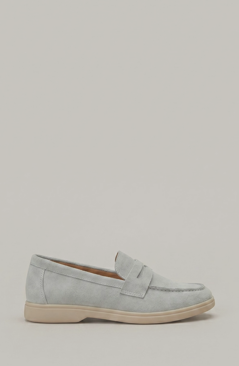 LORVENE Parisian Luxe loafers in black leather with classic slip-on design and elegant stitching, displayed on a neutral background.