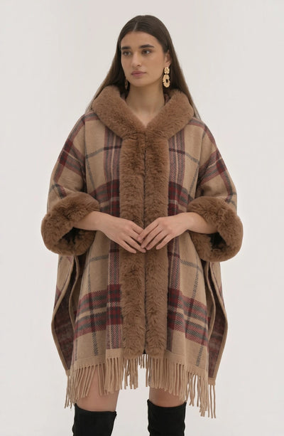 LORVENE Heritage Cashmere Shawl draped over a chair, showcasing soft, luxurious beige cashmere with fringed edges.