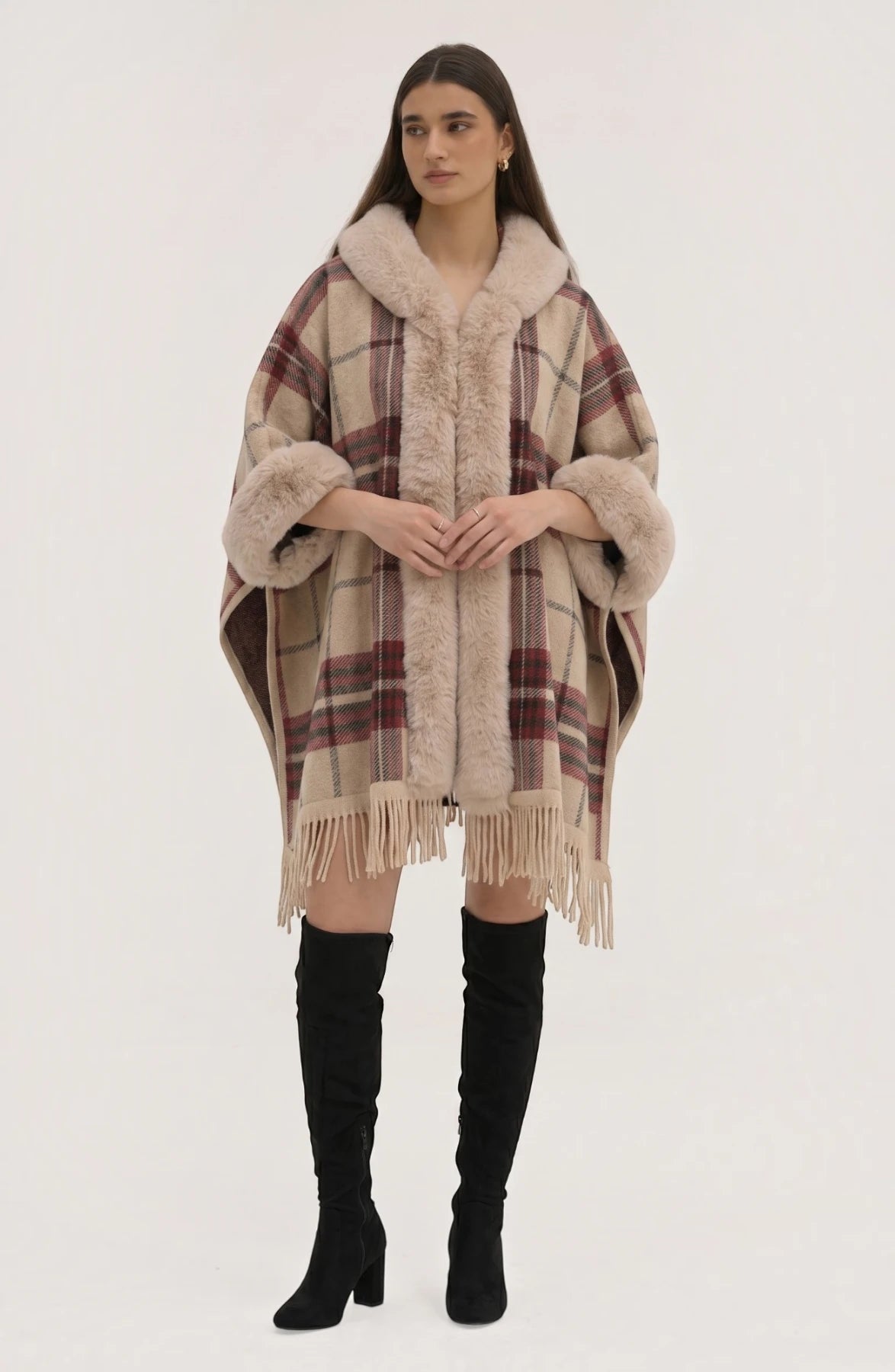 LORVENE Heritage Cashmere Shawl draped over a chair, showcasing soft, luxurious beige cashmere fabric with elegant fringed edges.
