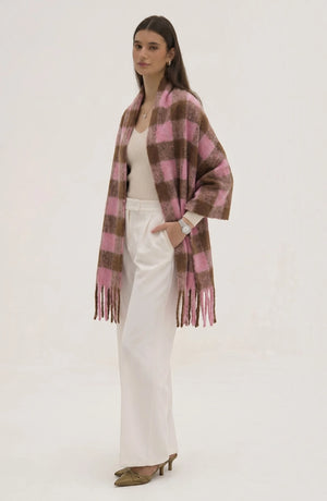 Lightweight LORVENE evening shawl draped over a model, showcasing soft fabric and elegant design for formal occasions.