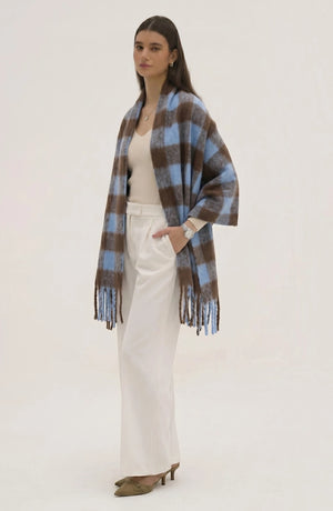 LORVENE lightweight evening shawl draped over a mannequin, showcasing soft fabric and elegant design for formal occasions.