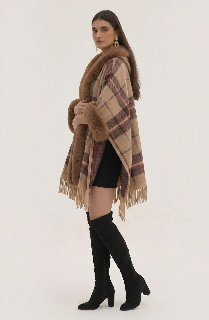 LORVENE Heritage Cashmere Shawl draped over a chair, showcasing soft beige fabric with intricate fringe detailing.