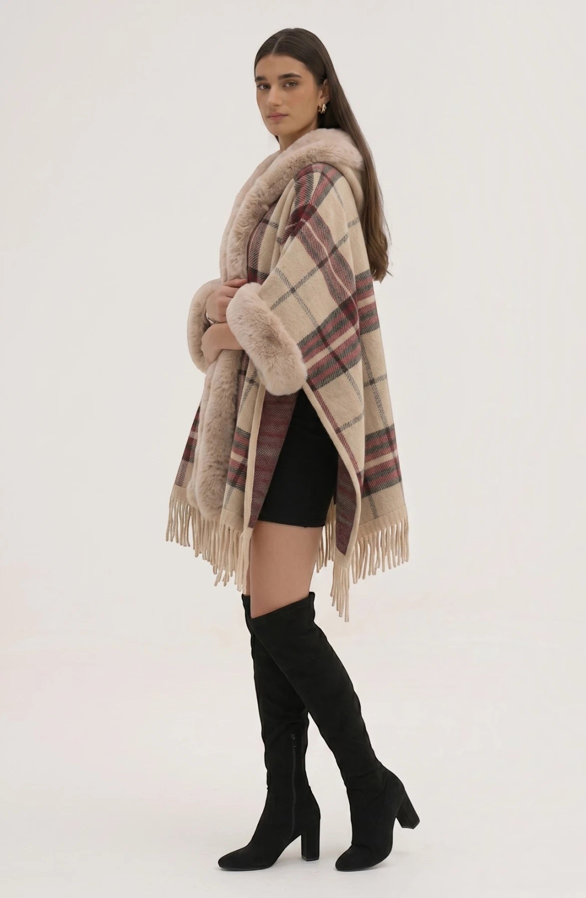 LORVENE Heritage Cashmere Shawl draped over a chair, showcasing its soft texture and elegant design in neutral tones.