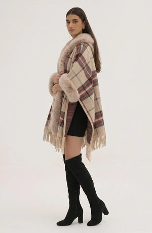 LORVENE Heritage Cashmere Shawl draped over a chair, showcasing its soft texture and elegant design in neutral tones.