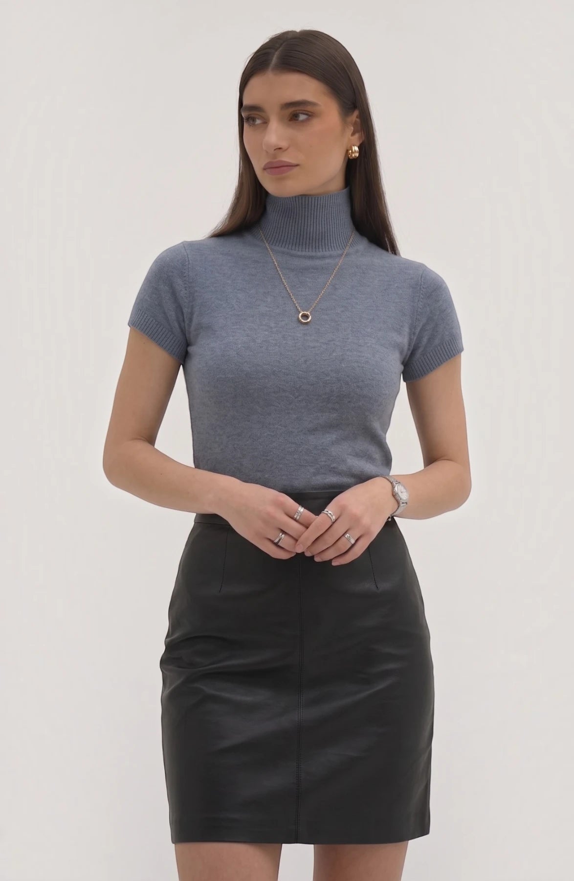 LORVENE Pure Poly Blend High Neck sweater, soft fabric with a snug fit, shown in a close-up view of the neckline and texture.