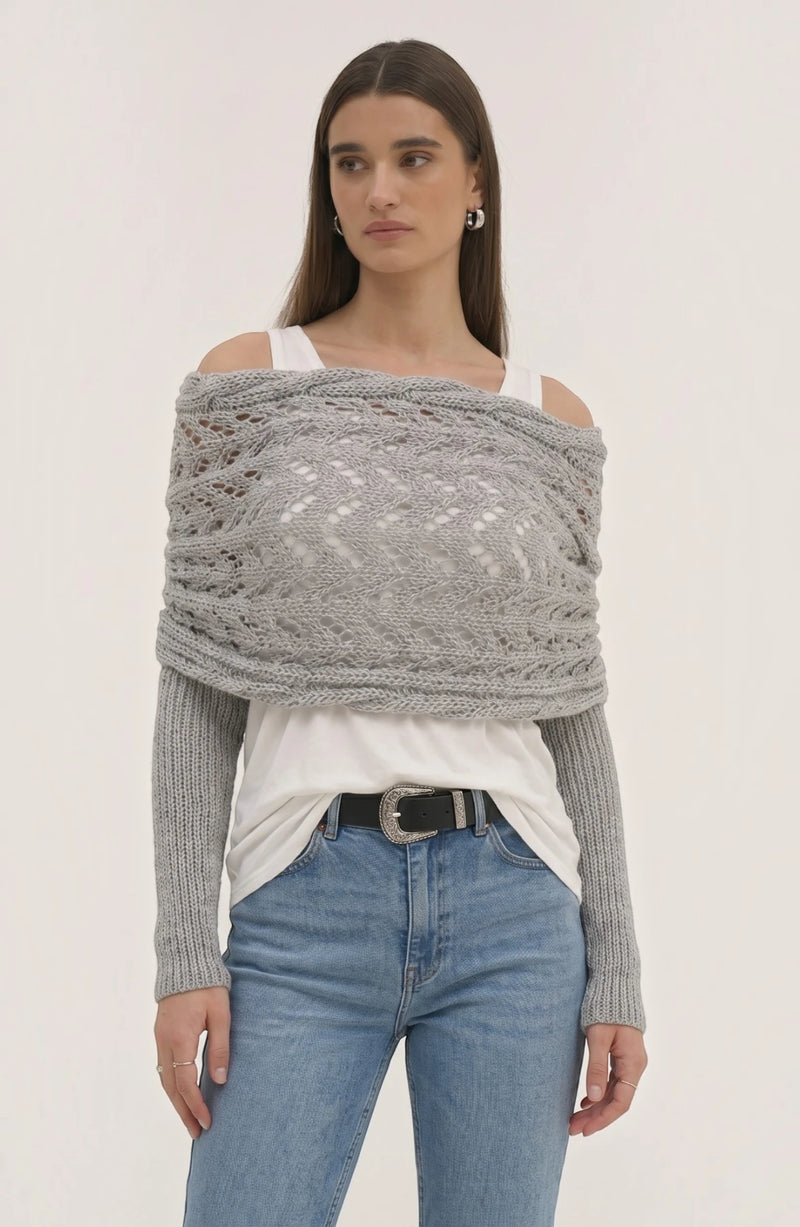 LORVENE Classic Pashmina Wrap draped over a neutral background, showcasing soft, luxurious fabric and elegant style.