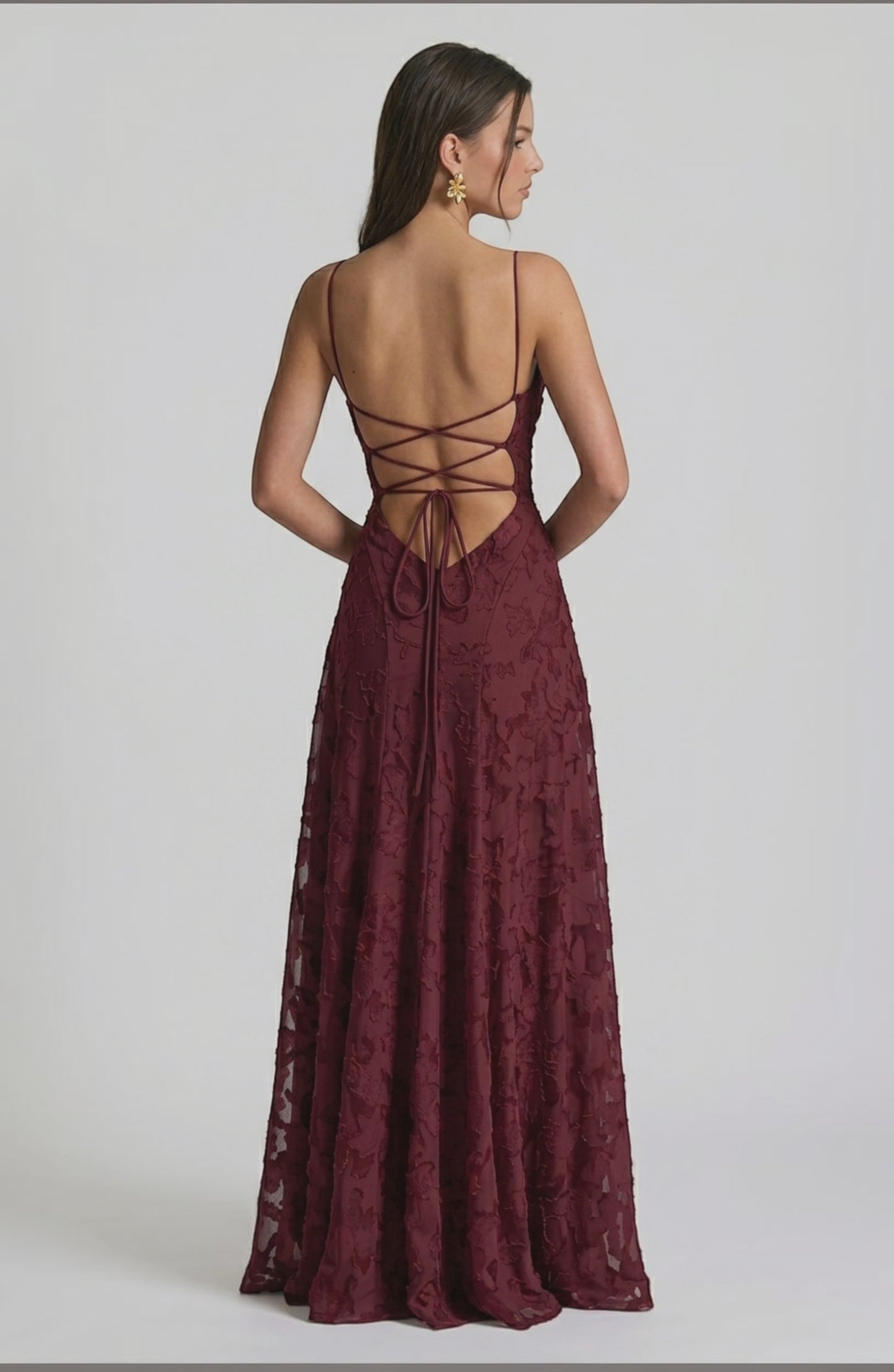 LORVENES sexy flowy bridal dress with a flowing silhouette and elegant design, displayed from the bottom left angle.