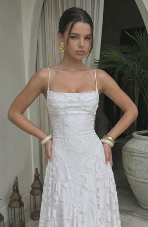 Flowy bridal dress by LORVENES featuring elegant, lightweight fabric and intricate details, shown from the bottom right angle.