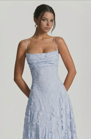 LORVENES sexy flowy bridal dress with ruffled details and elegant fabric, shown from the bottom right angle.