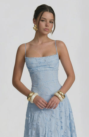 Flowy bridal dress by LORVENES featuring delicate fabric and elegant design, shown from the bottom right angle.