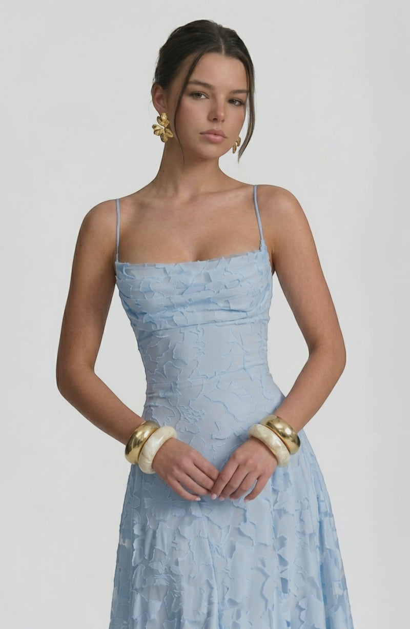 Flowy bridal dress by LORVENES featuring delicate fabric and elegant design, shown from the bottom right angle.