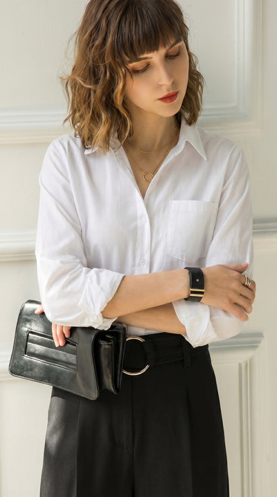 LORVENE Pocket White Shirt, close-up showing front with chest pocket and button details on crisp white fabric.