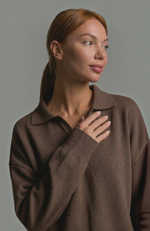 LORVENES knit trouser set worn by a model, featuring a cozy, stylish knit top and matching trousers in soft, neutral tones.
