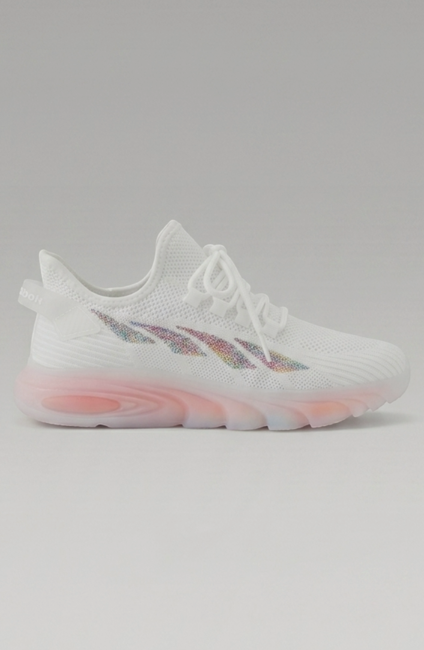 LORVENE Cloud Ease sneakers shown from a bottom-left angle, featuring a sleek white design with textured sole and modern athletic style.
