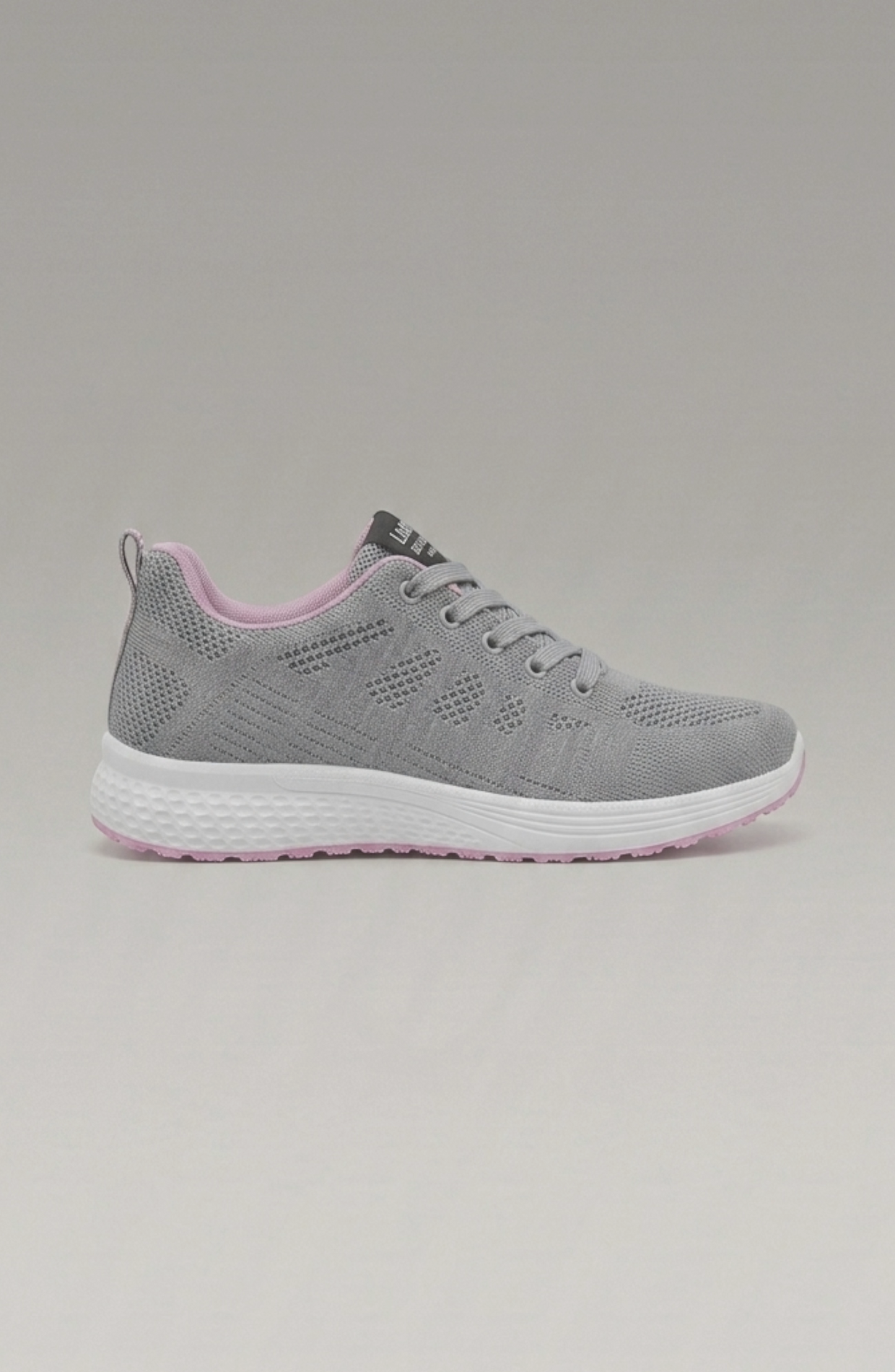 LORVENE Pure Storm sneakers shown from the bottom left angle, featuring sleek design and white sole details.