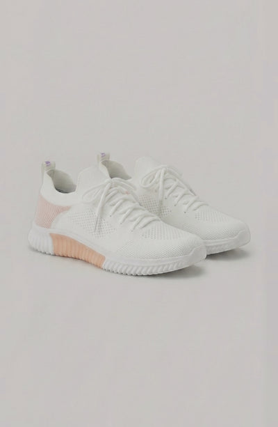 LORVENE Polar Crest sneakers showing the textured rubber sole and stylish design in a close-up image.