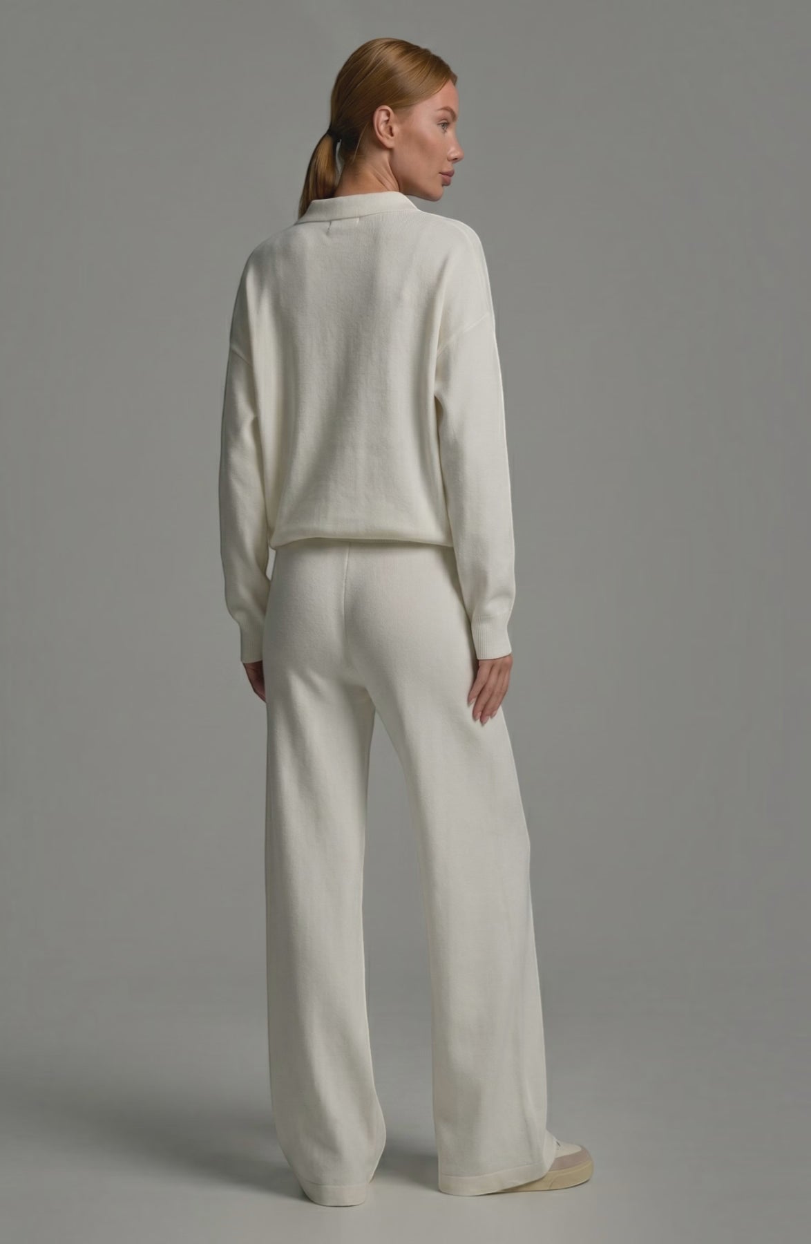 LORVENES knit trouser set featuring a cozy, textured knit fabric, with the model wearing the matching top and trousers in a neutral color.
