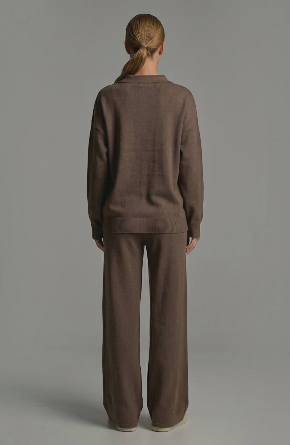 LORVENES knit trouser set with a fitted top and matching wide-leg pants, model showing casual chic style in a neutral tone.