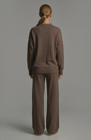 LORVENES knit trouser set with a fitted top and matching wide-leg pants, model showing casual chic style in a neutral tone.