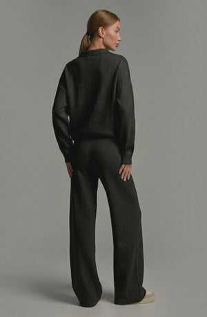 LORVENES knit trouser set shown on model, featuring a cozy, stylish matching top and pants in a soft, wearable knit fabric.