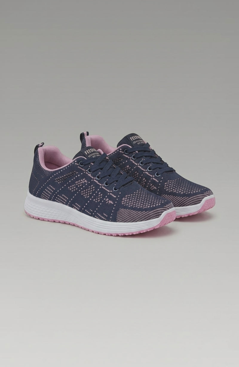 LORVENE Pure Storm sneakers with white sole and sleek black design, shown from a bottom right angle.