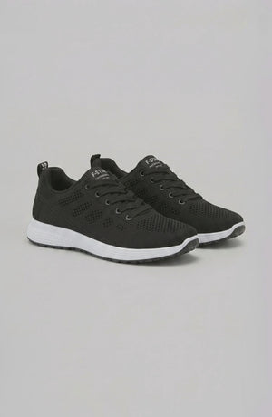 LORVENE Pure Storm sneakers shown from the bottom right angle, featuring sleek design and rubber sole in a modern athletic style.