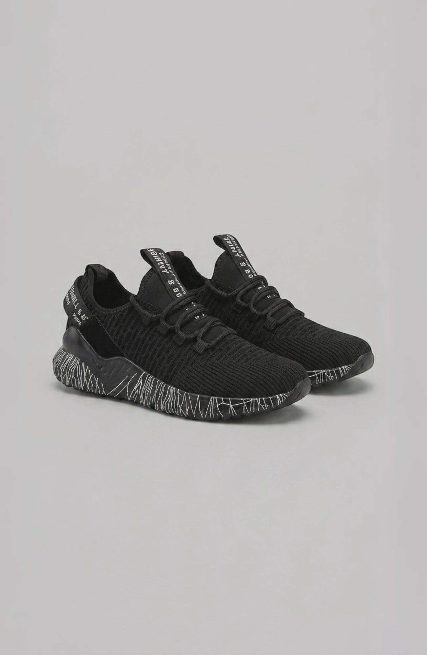 LORVENE Chrome Path sneakers shown from the bottom right angle, highlighting the stylish rubber sole and sleek design.