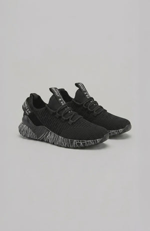 LORVENE Chrome Path sneakers shown from the bottom right angle, highlighting the stylish rubber sole and sleek design.