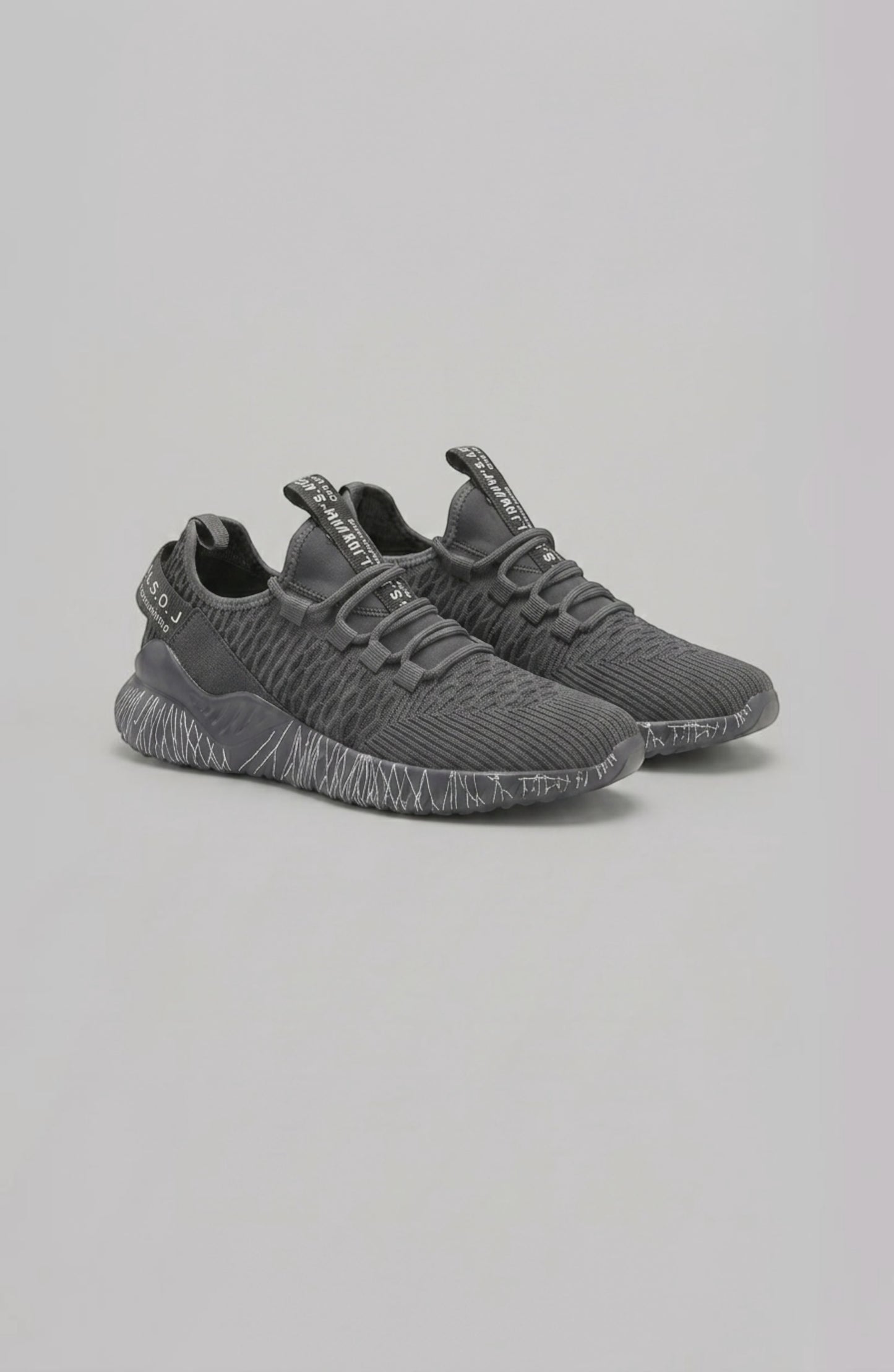 LORVENE Chrome Path sneakers showing the bottom right pose with sleek chrome accents and white rubber soles.