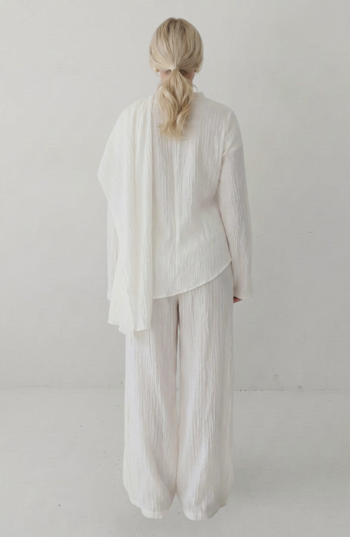 LORVENES 2025 Loriya solid color buttoned cardigan and pants two-piece set, casual style, shown in a relaxed pose.
