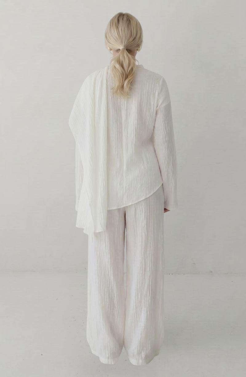 LORVENES 2025 Loriya solid color buttoned cardigan and pants two-piece set, casual style, shown in a relaxed pose.