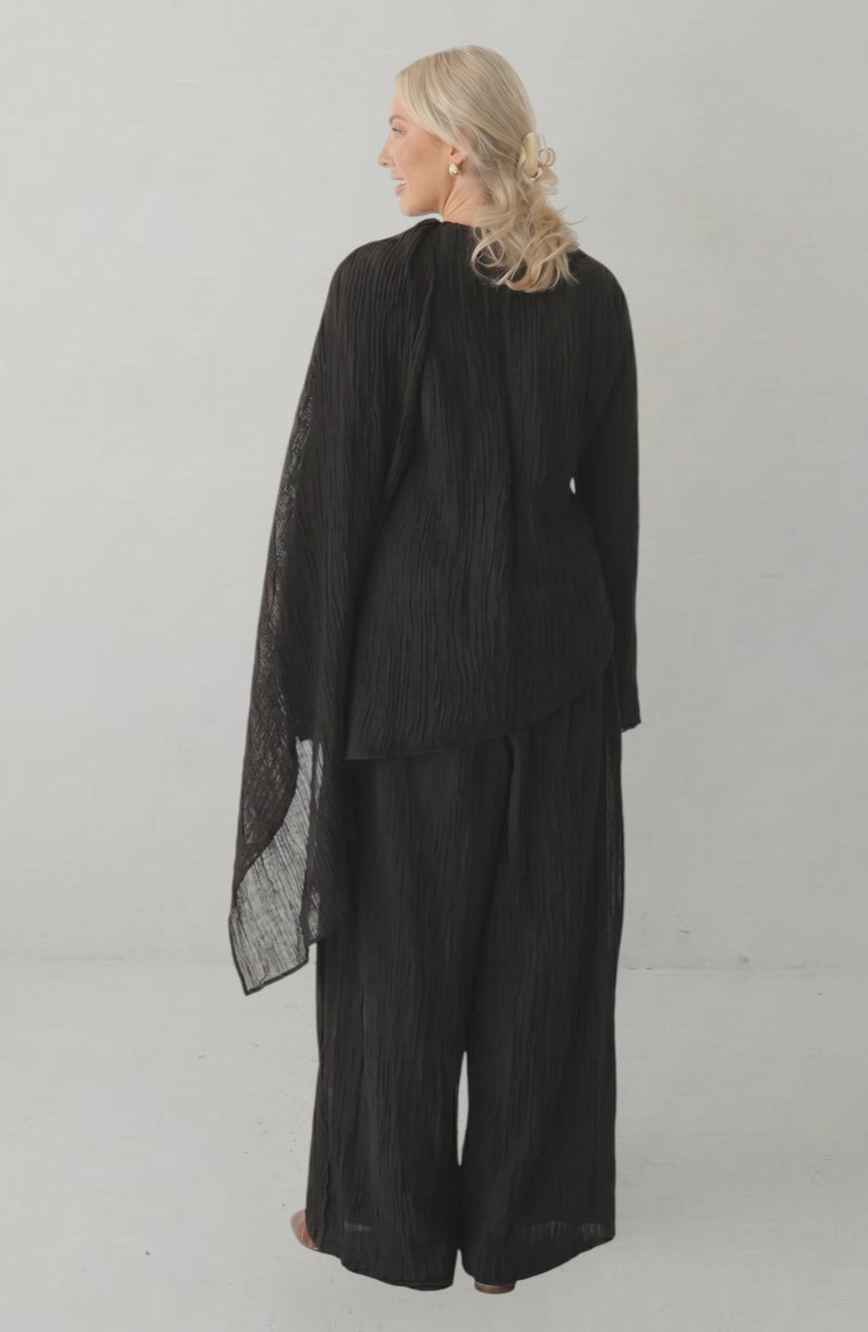 LORVENES 2025 Loriya solid color cardigan and pants two-piece set, featuring button details and a relaxed fit.