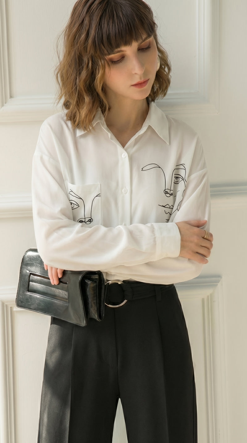 LORVENE double pocket shirt featuring a classic design with two front pockets, long sleeves, and a button-up front.