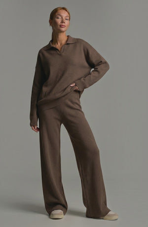LORVENES knit trouser set featuring a cozy, textured top and matching trousers worn by a model. Stylish and comfortable casual wear.
