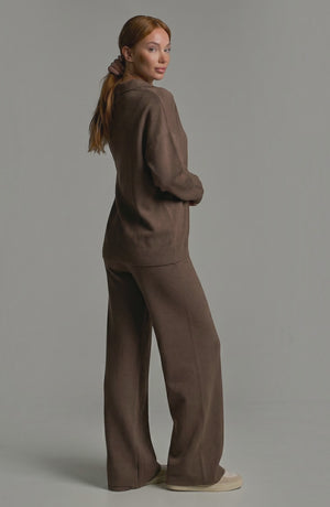 LORVENES knit trouser set featuring a cozy, stylish top and matching trousers worn by a model, perfect for casual wear.